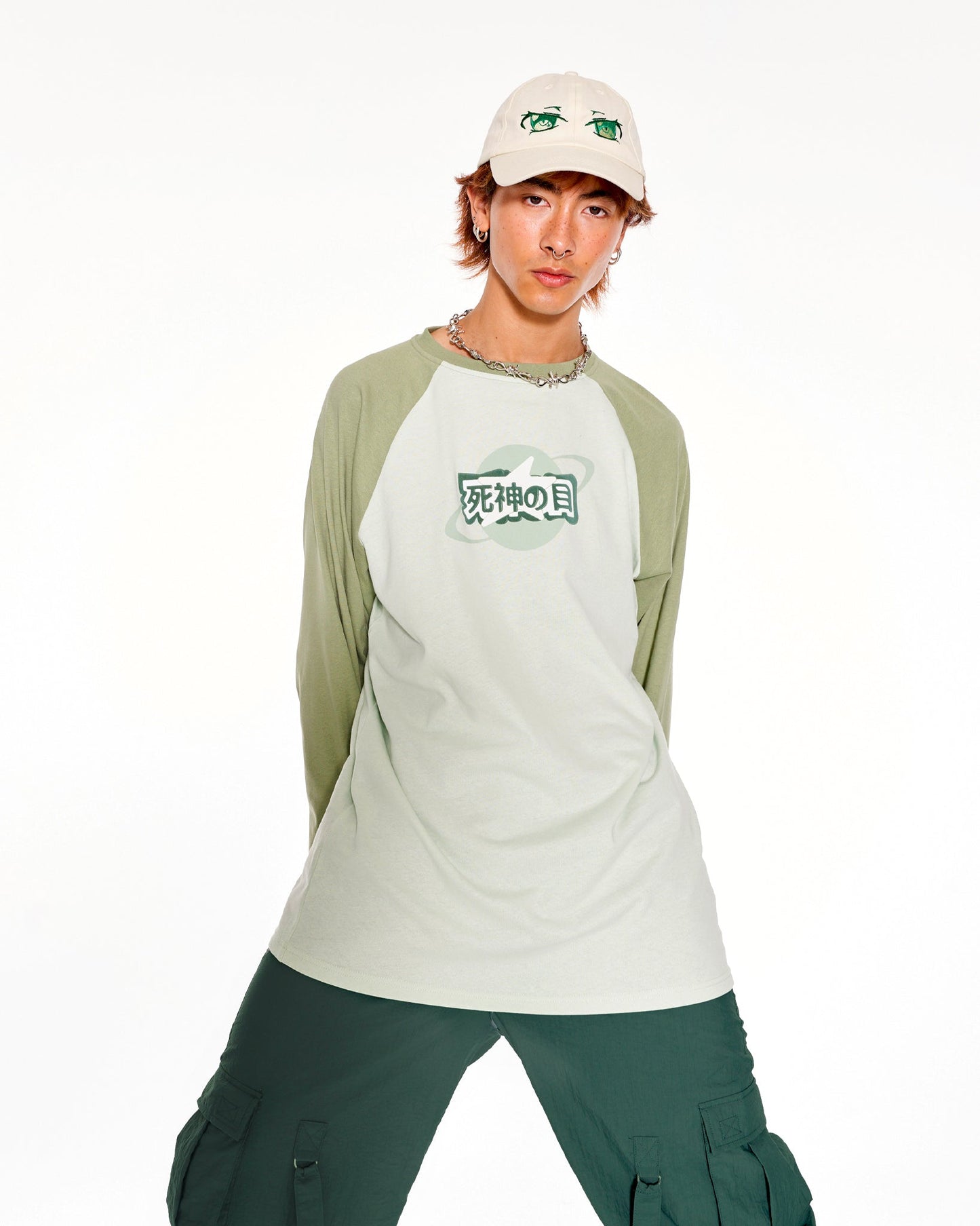 Time Traveler Oversized Raglan Long Sleeve Top With Graphic In Green