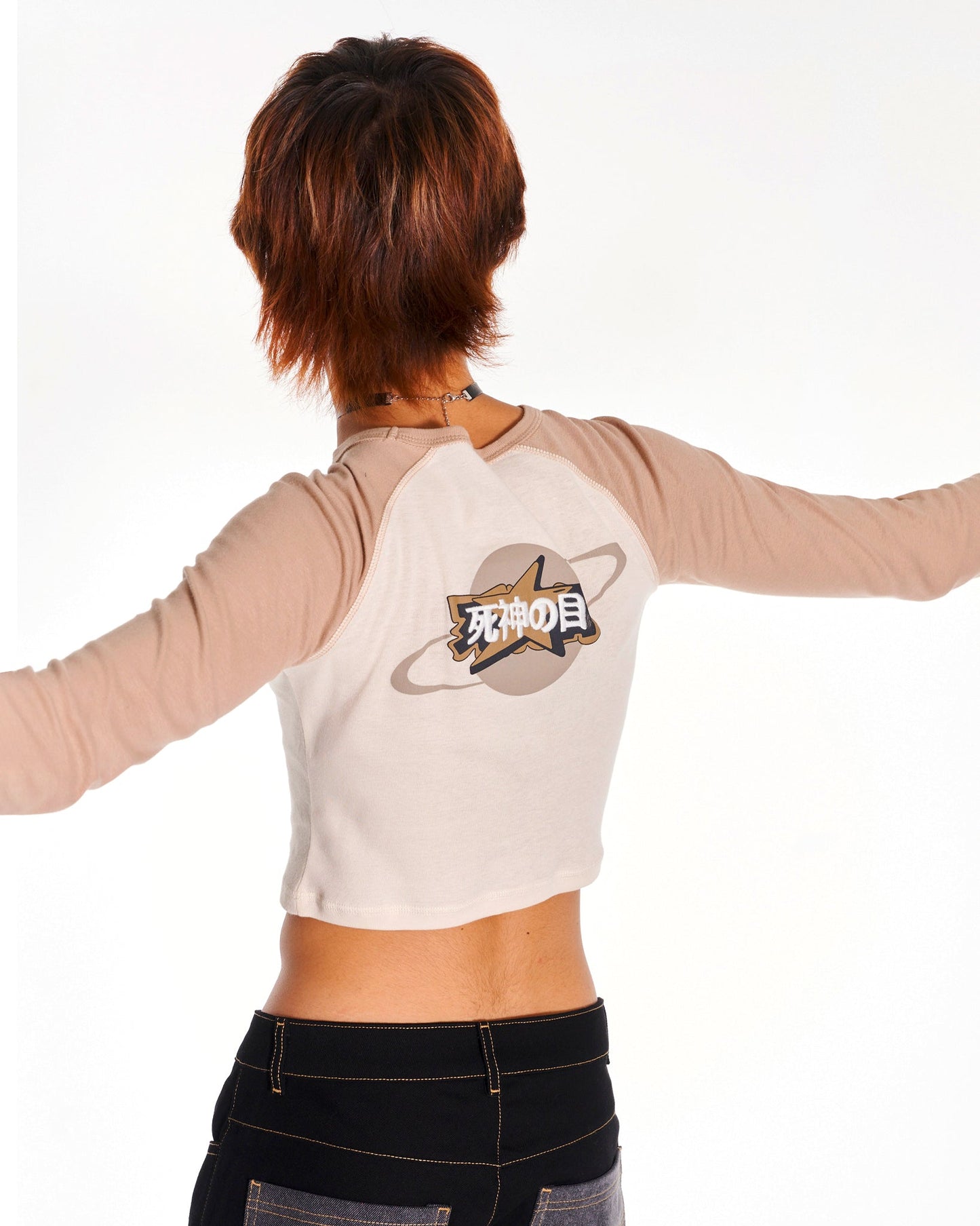 Cosmic Baby Graphic Long Sleeve Crop Top