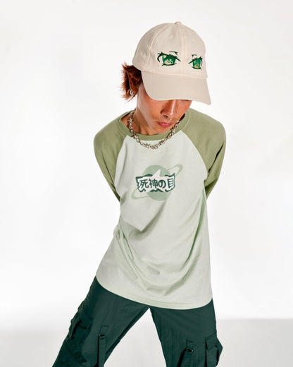 Time Traveler Oversized Raglan Long Sleeve Top With Graphic In Green