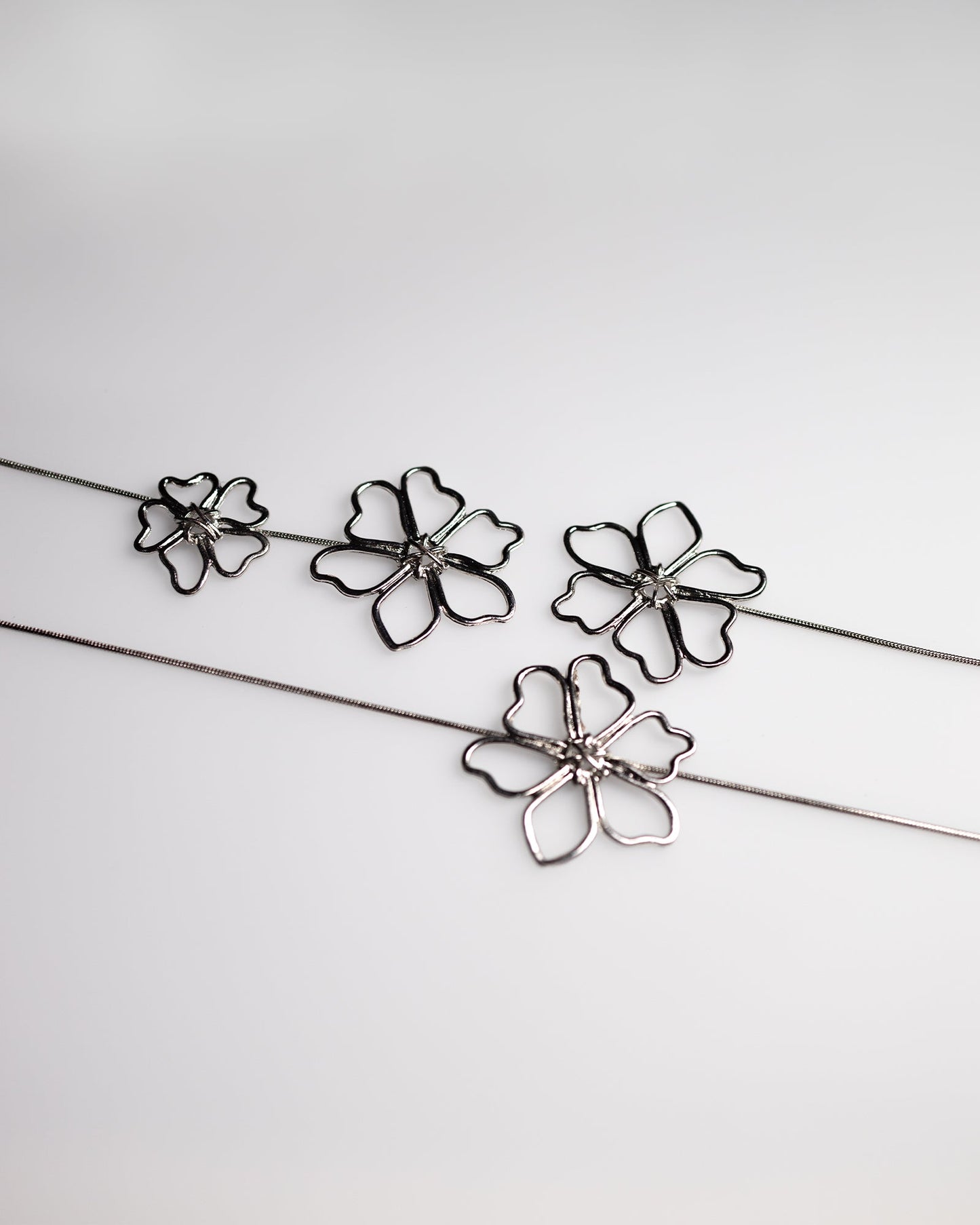 Floral Infinity Drop Necklace in Silver