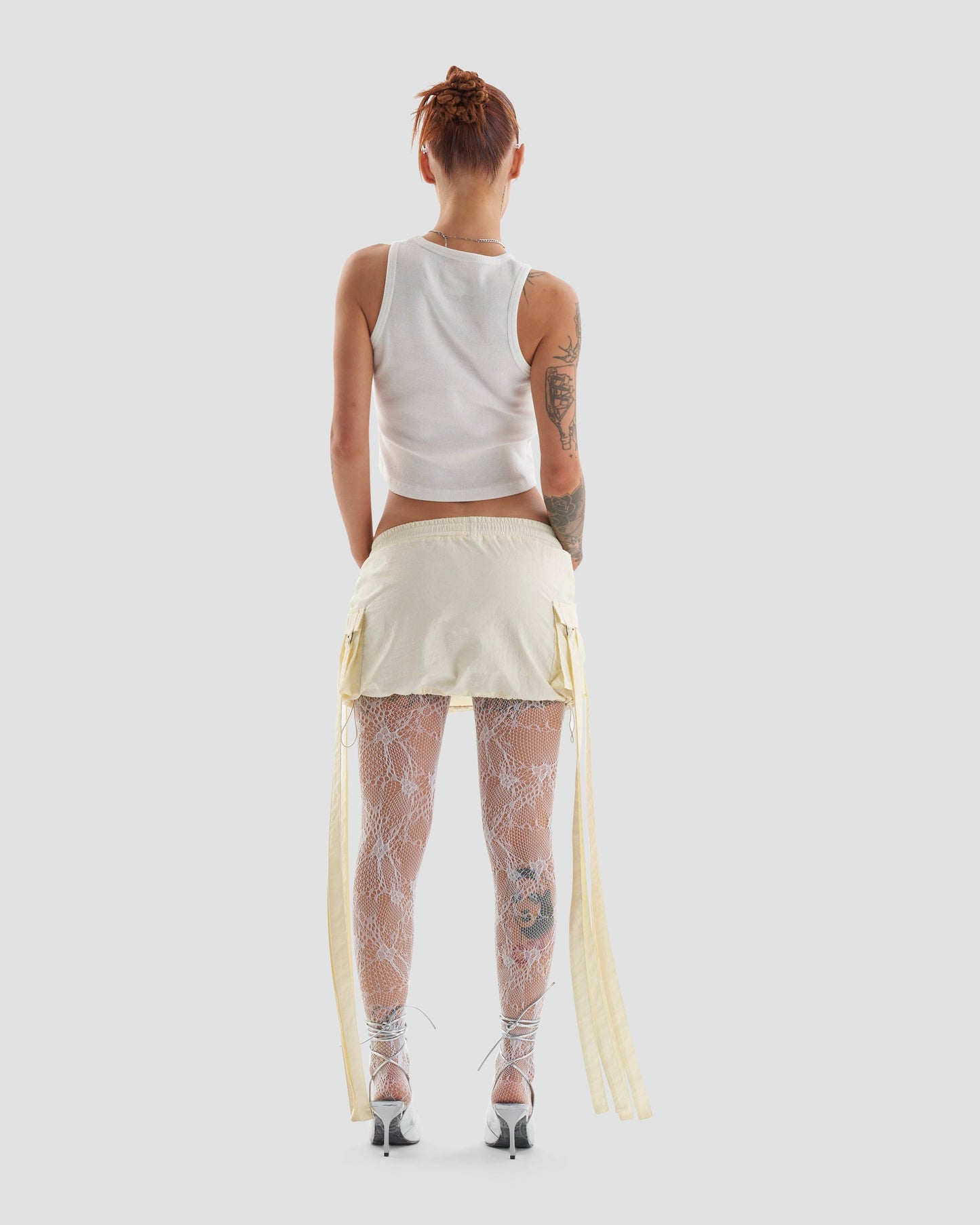 Club Kid Parachute Technical Cargo Mini Skirt in Off White