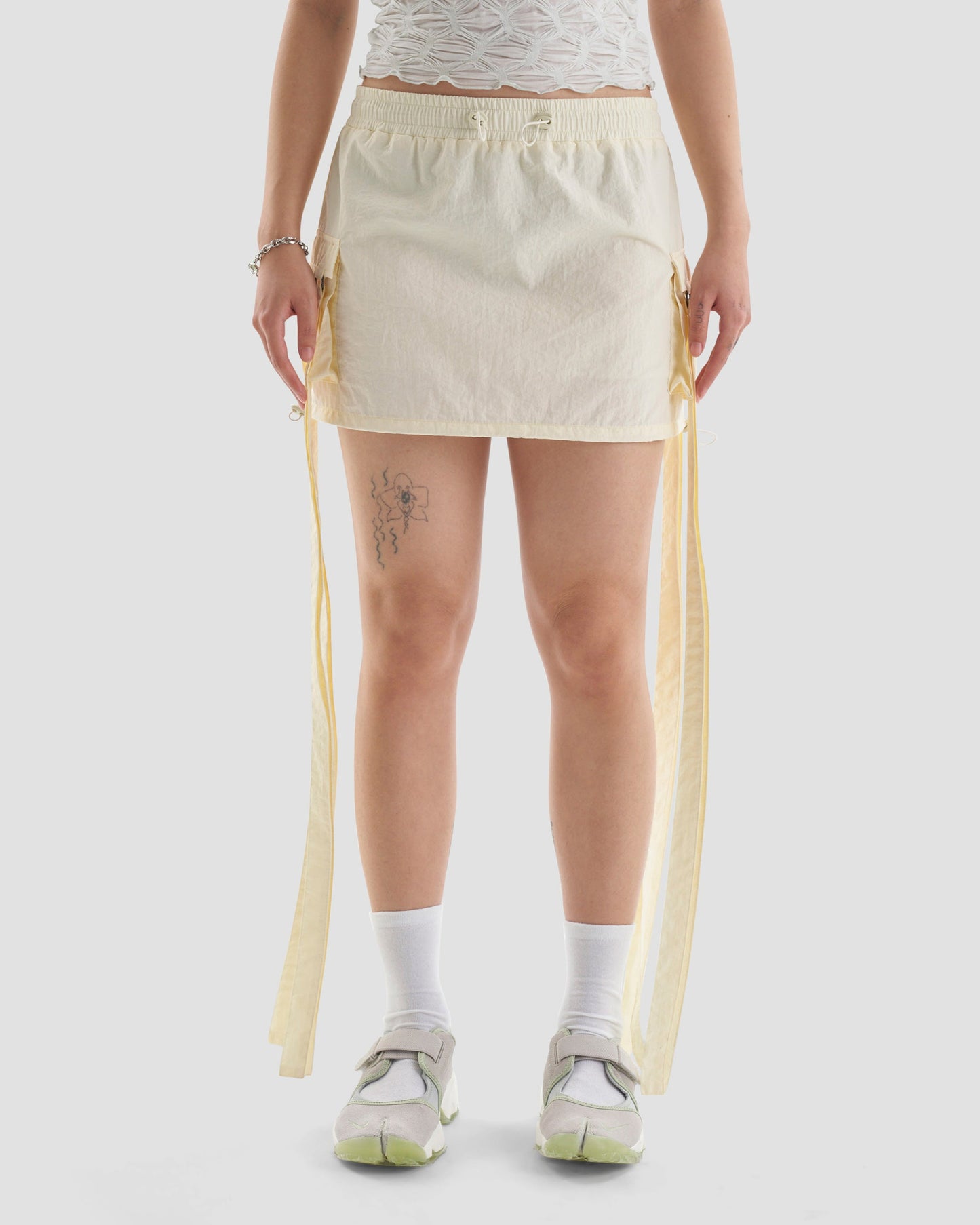 Club Kid Parachute Technical Cargo Mini Skirt in Off White