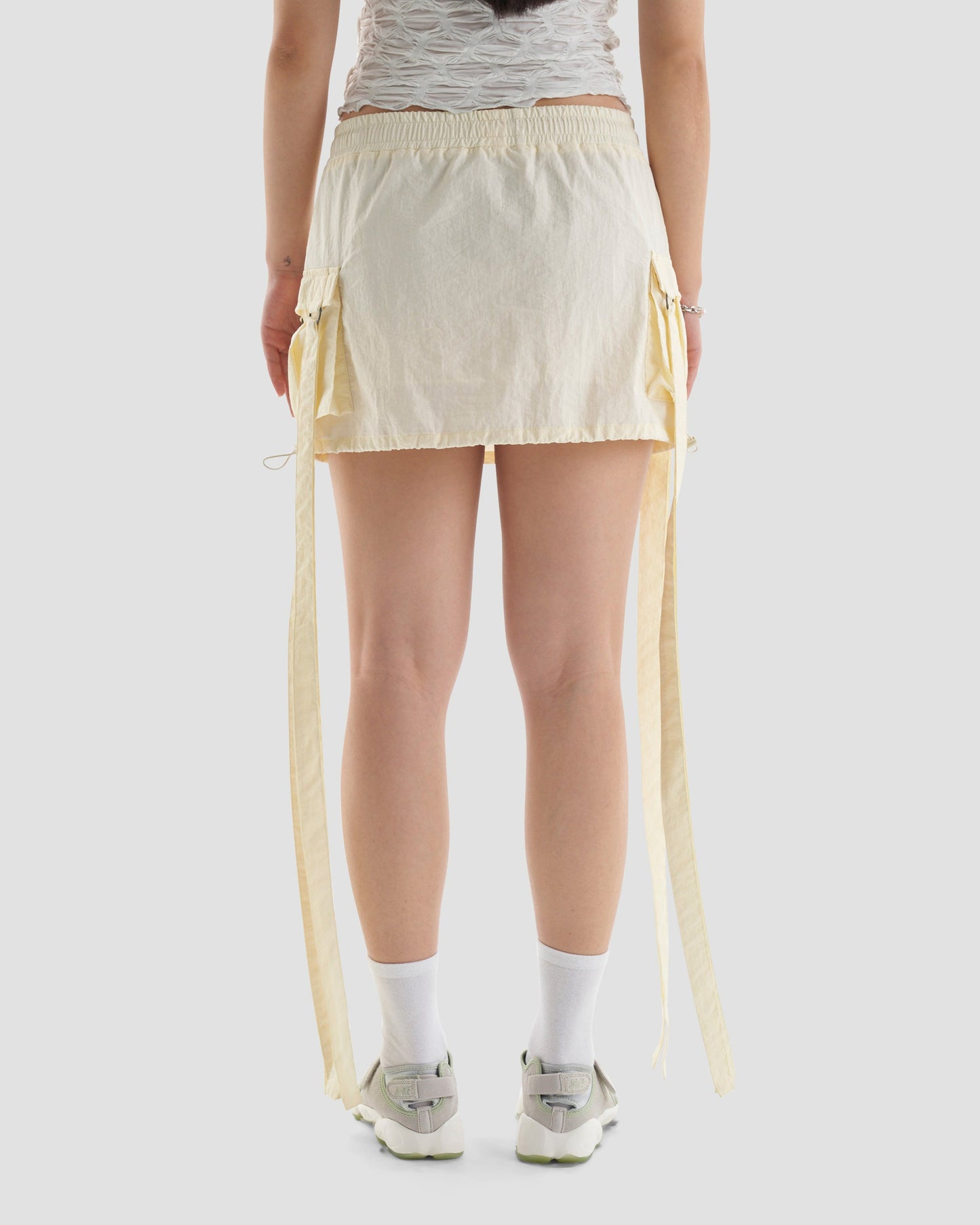 Club Kid Parachute Technical Cargo Mini Skirt in Off White