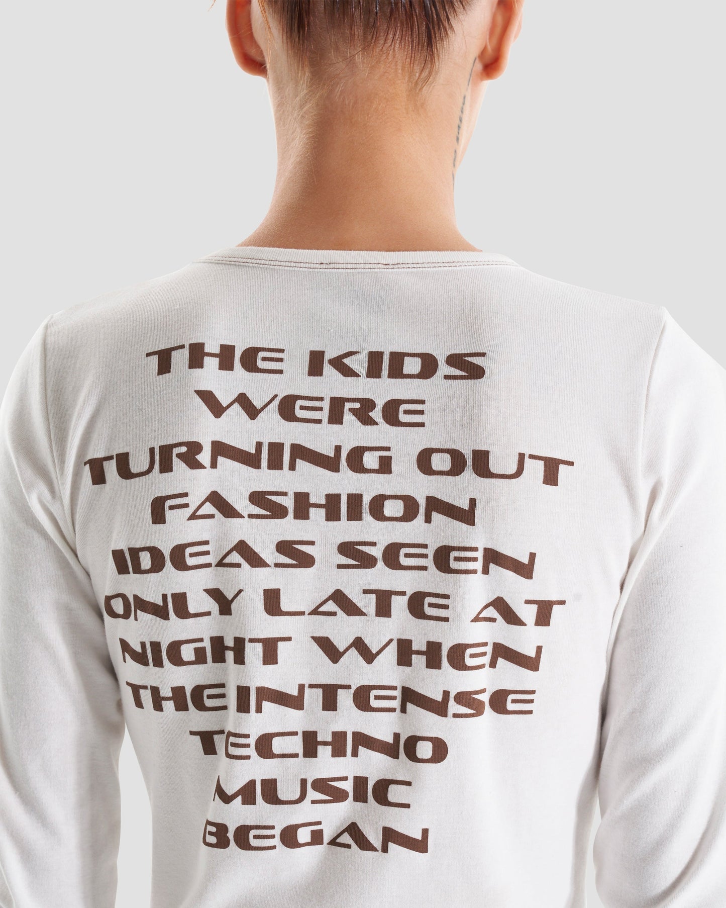 Club Kid Long Sleeve Slogan Top in Off White